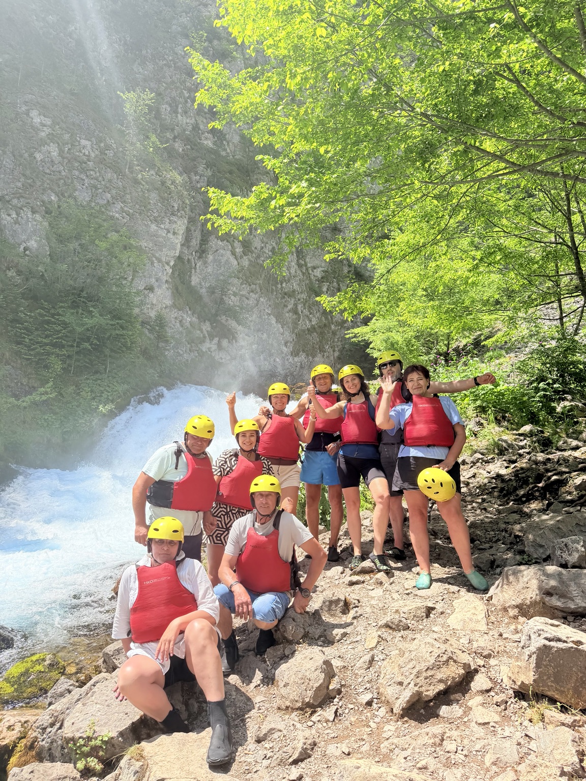Rafting group beside the water