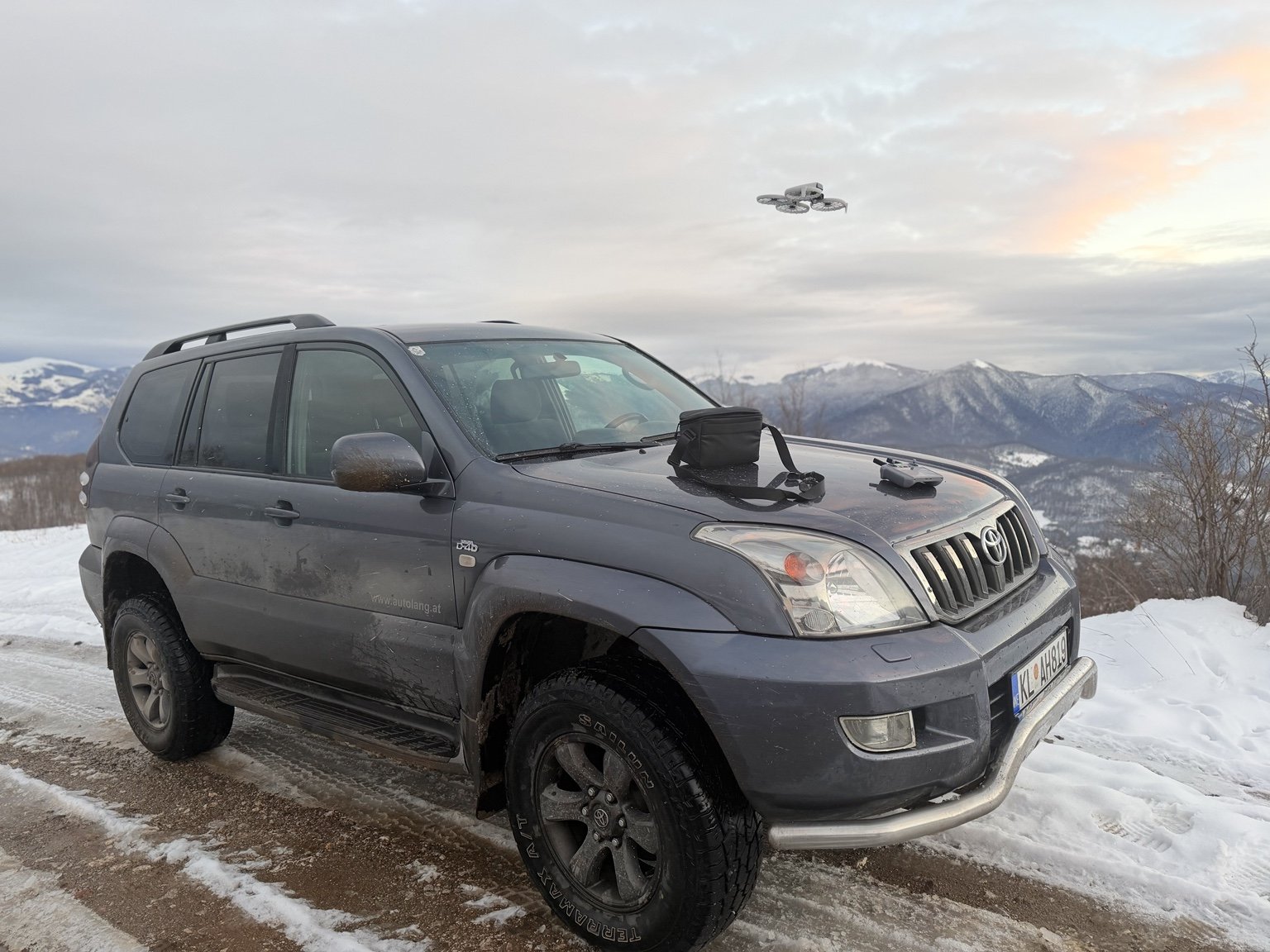 Jeep safari in the snowy mountains
